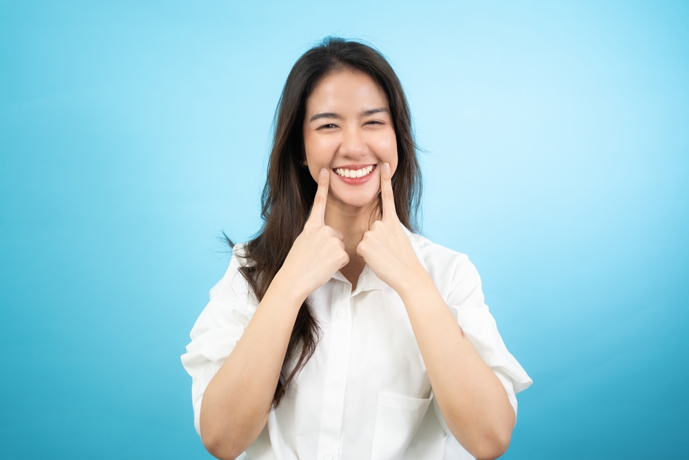 Front,View,Half-body,Image,Of,A,Happy,Asian,Woman,Standing